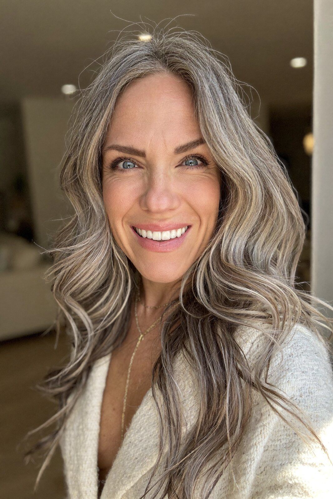 Close-up — voluminous waves, bright smile