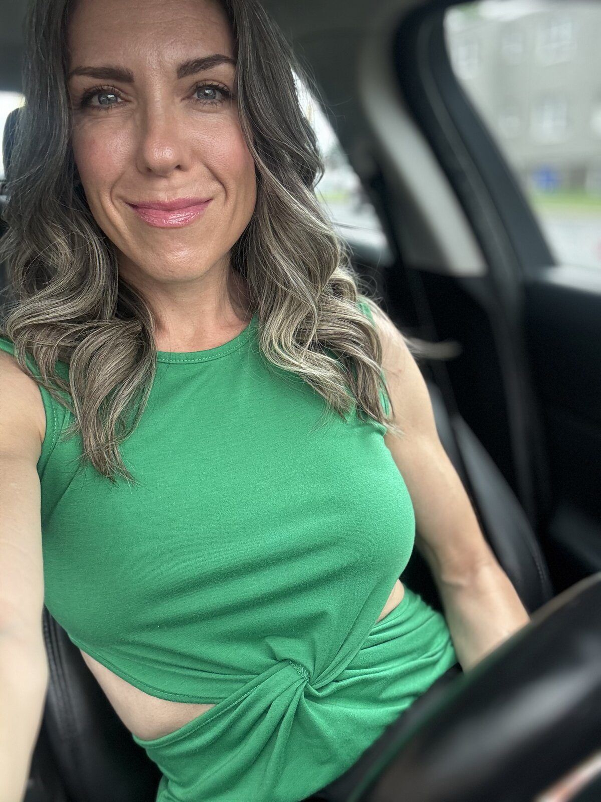 Christine — selfie, green top